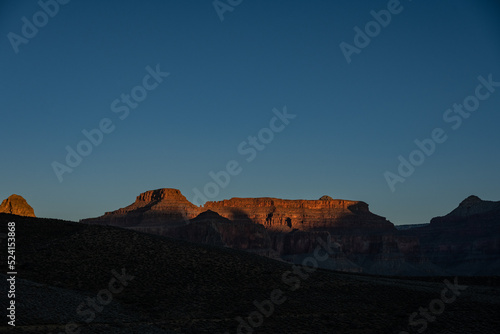 Morning Light Strikes The Upper Elevations of Grand Canyon