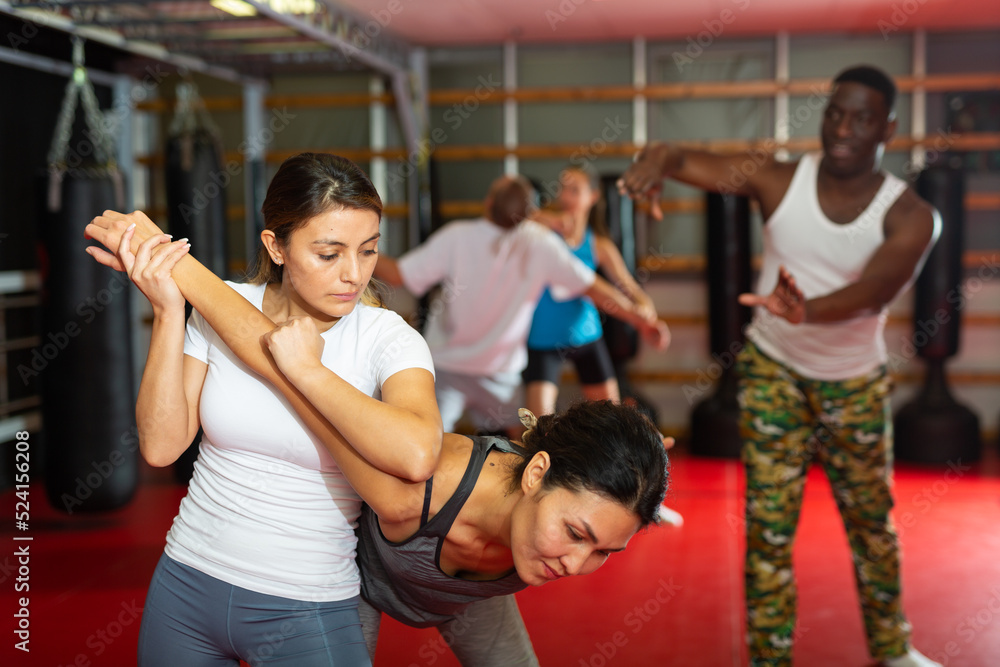 Womens sparring in self defense courses in the gym