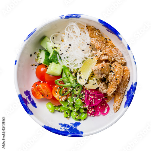 Poke with chicken, rice, cucumbers,tomatoes,lime,edamame and caramelised onion on bowl isolated on white background top view photo