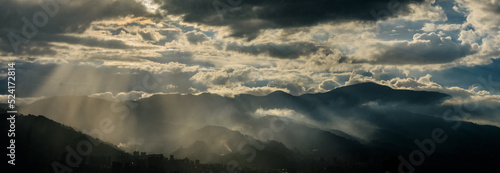 Smog contamination pollution in the mountains of the city of medellin colombia antioquia red and dirt