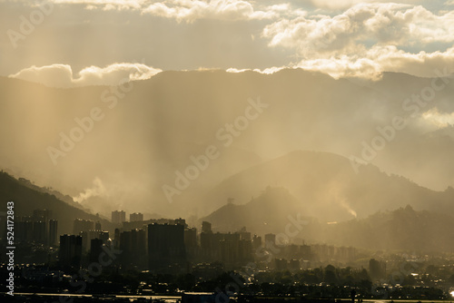 Smog contamination pollution in the mountains of the city of medellin colombia antioquia red and dirt © cafera13