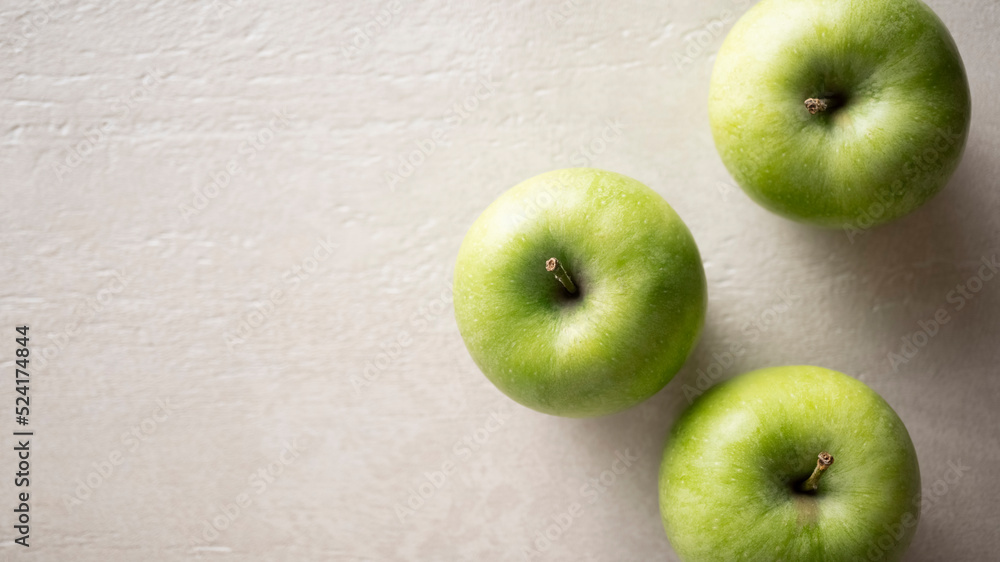 Green apples on the table, close up Green apples on the table, close up