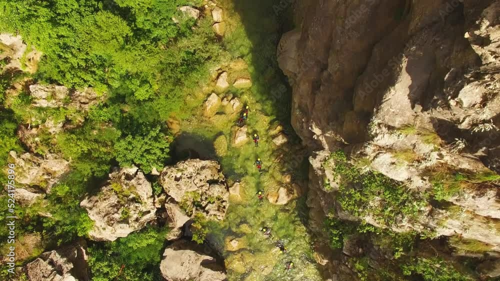 People swimming in river, green nature and rocks. People swimming in river, green nature and rocks.