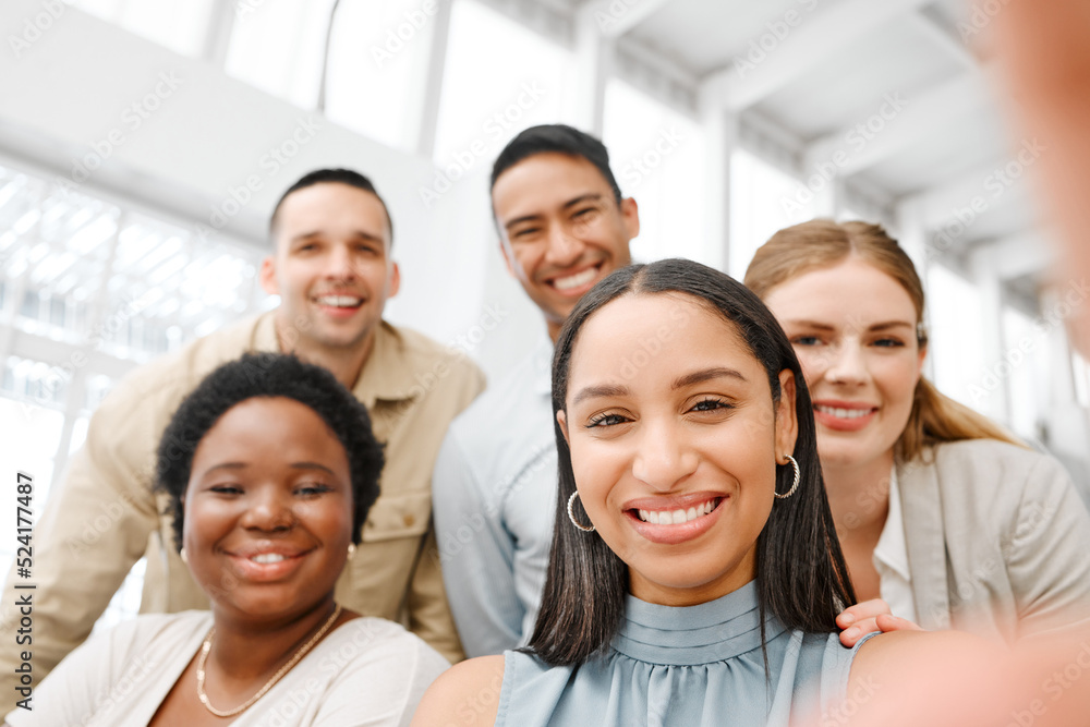 Selfie with fun friends in the office, working together as a team of business people and professional colleagues. Closeup portrait of a diverse corporate group with a mindset and mission of growth Selfie with fun friends in the office, working together as a team of business people and professional colleagues. Closeup portrait of a diverse corporate group with a mindset and mission of growth