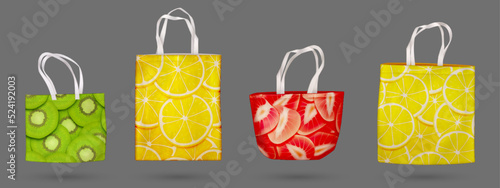 Cotton eco bags, summer fabric tote with fruit patterns.Textile reusable shoppers and beach bags with handles and print of orange, kiwi and strawberry slices, vector realistic mockup