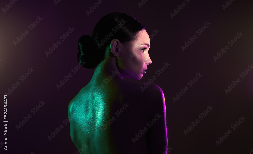 female back. beauty young woman in color lights female back. beauty young woman in color lights