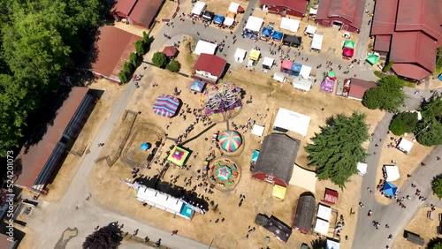 Aerial view of an active fairgrounds on a hot summer day in America. photo