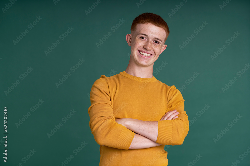 Portrait of smiling ginger young man