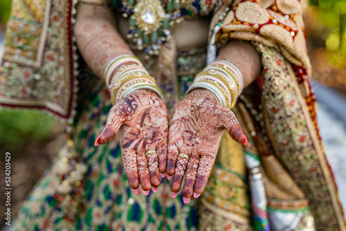 Indian bride's wedding henna mehendi mehndi hands close up © Stella Kou