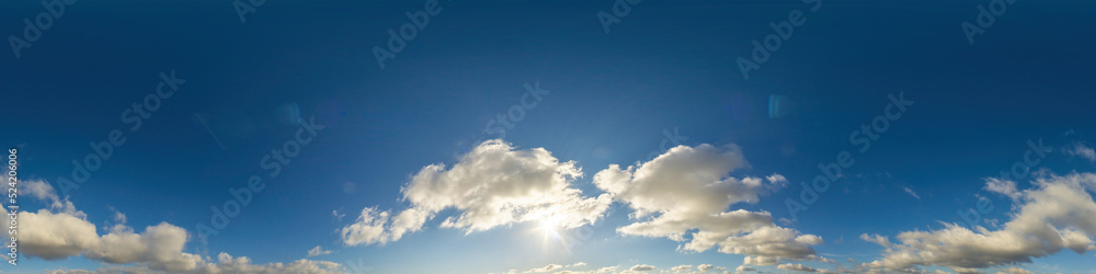 Obraz premium Blue sky panorama with puffy Cumulus clouds. Seamless hdr pano in spherical equirectangular format. Sky dome or zenith for 3D visualization, game and sky replacement for aerial drone 360 panoramas.