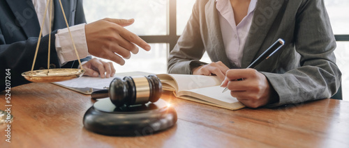 Obraz na plátně Businessman and Male lawyer or judge consult having team meeting with client, Law and Legal services concept