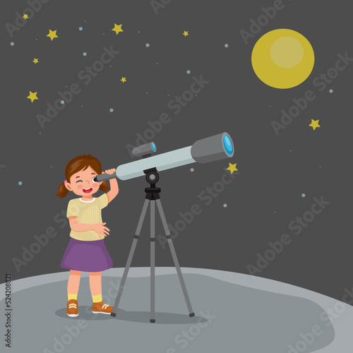 cute little girl using telescope looking at star and galaxies at night