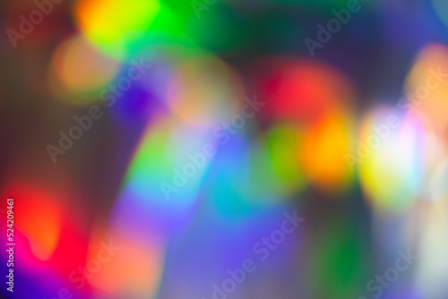 Colorful bokeh on on brigt backgroud. Abstract, Festive,party design with bright circles particles. photo