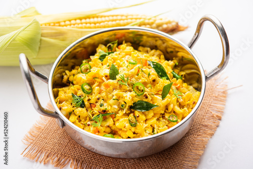 Sweet Corn Upma, makai rava uppittu made using with or without semolina , healthy Indian breakfast photo