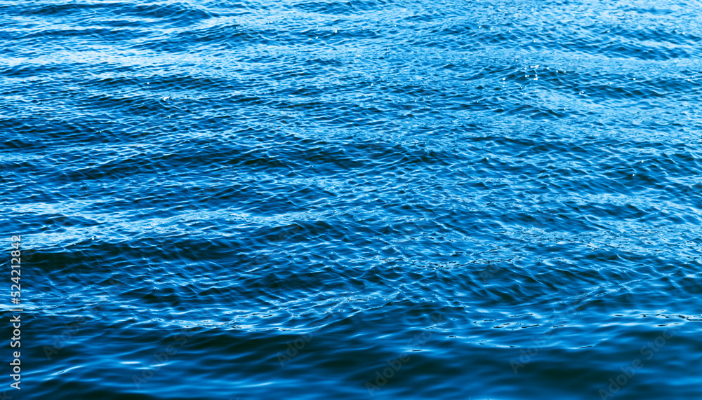 Blue sea surface for background. Selective focus. Blue sea surface for background. Selective focus.