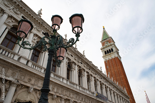 Marciana library and bell tower in St. Mark's square in Venice, Italy photo