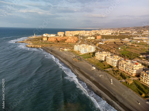 Aerial panoramic view on coastline in Torrox Costa, Costa del Sol, small touristic town between Malaga and Nerja, Andalusia, Spain photo