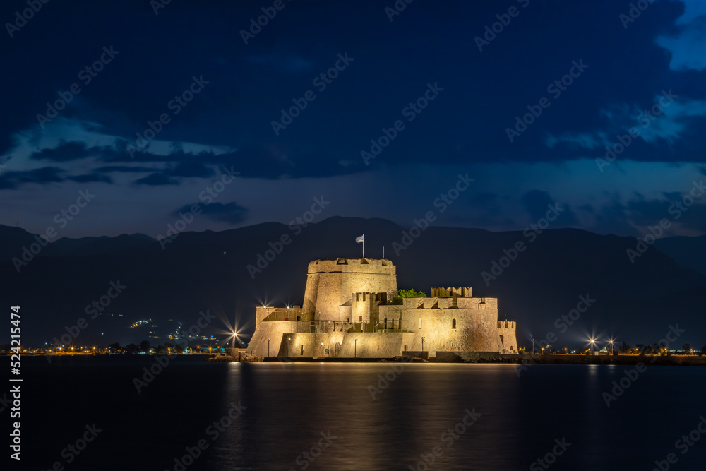 Blue Hour long exposure night view of the Bourtzi Castle in Nafplion, Greece