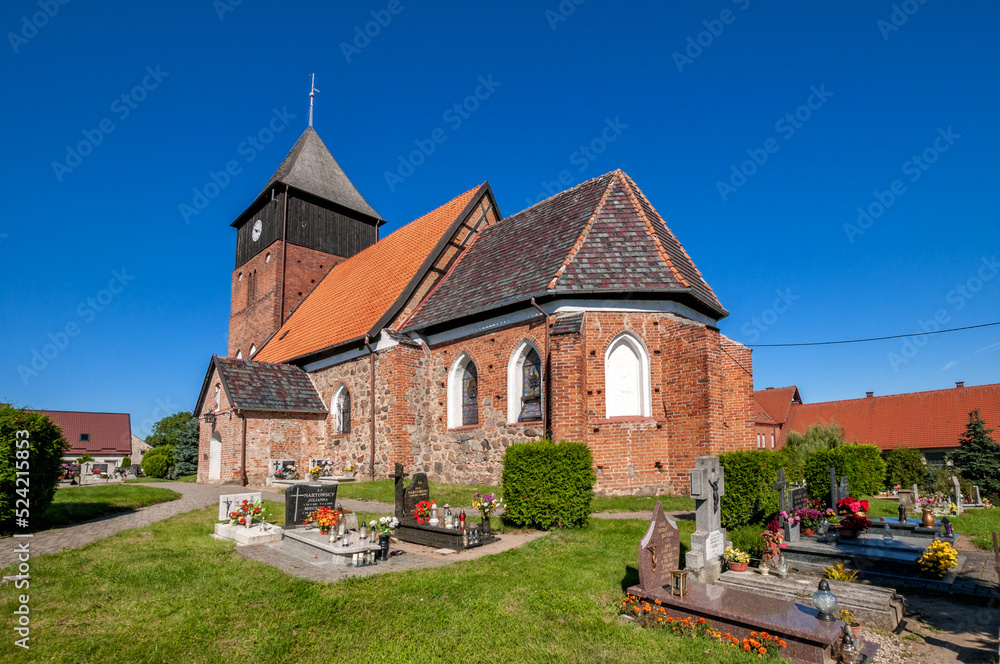 Fototapeta premium The Gothic Church of St. James the Apostle in Ostrowite, Pomeranian Voivodeship, Poland