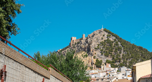 Castillo y cruz de santa Catalina en la ciudad de Jaén, España photo