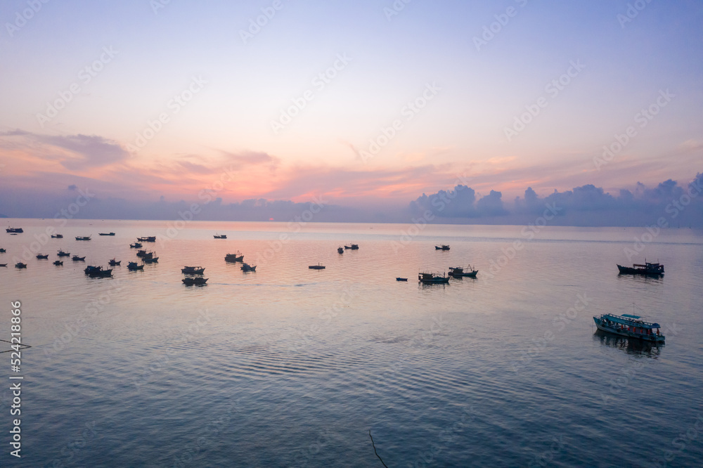 Fishing boats are anchored at Hon Son, Kien Giang, Vietnam in the Gulf of Thailand Fishing boats are anchored at Hon Son, Kien Giang, Vietnam in the Gulf of Thailand