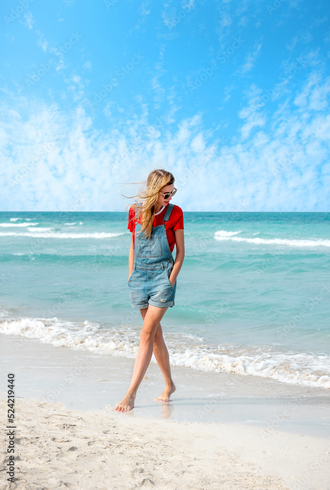 Beautiful young woman walking on the beach Varadero , Cuba