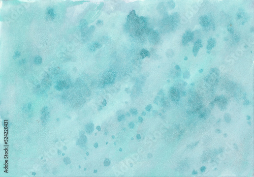 Teal watercolor splattered painted background 