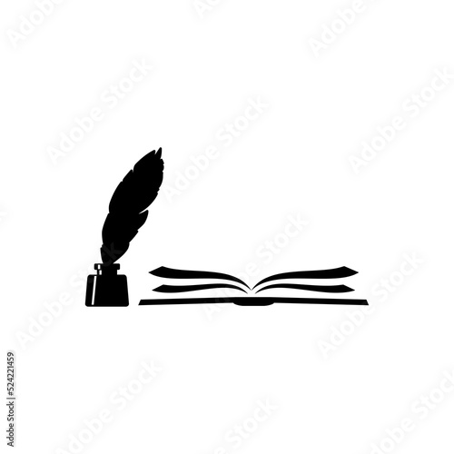 Open book with old pen feather and inkwell black