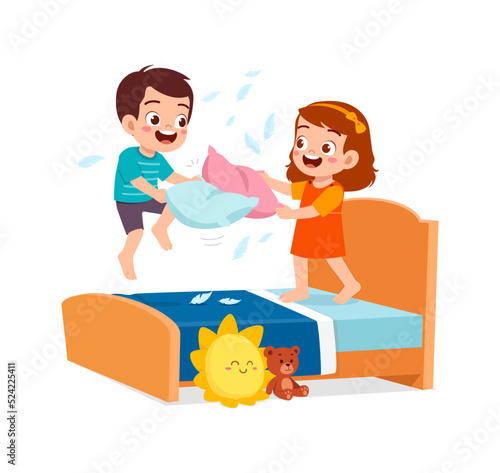 little kid play pillow fight with friend