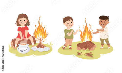 Little children camping around bonfire at summer camp. Happy kids cooking and warming themselves by fire cartoon vector illustration