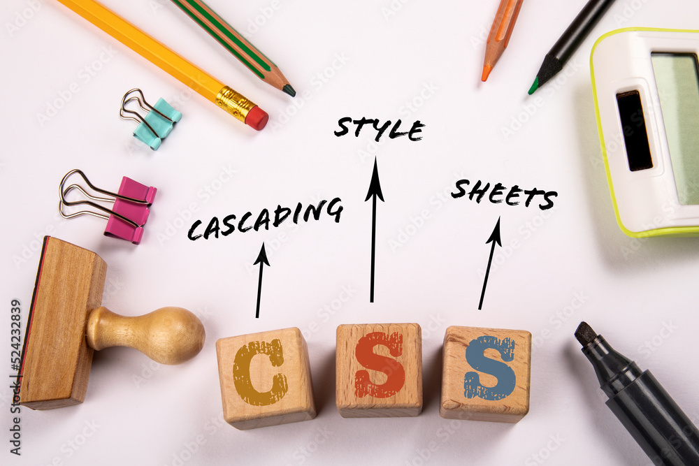 CSS - Cascading Style Sheets. Text on a white office table CSS - Cascading Style Sheets. Text on a white office table
