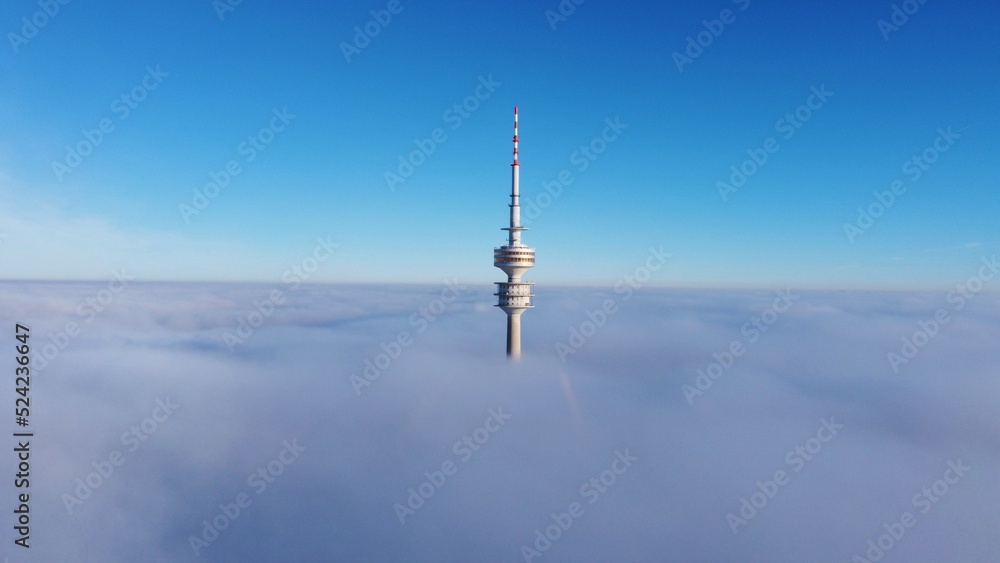 Olympic Tower of munich over fog - obrazy, fototapety, plakaty 