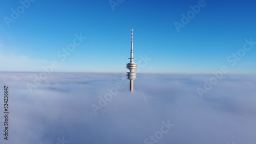 Olympic Tower of munich over fog