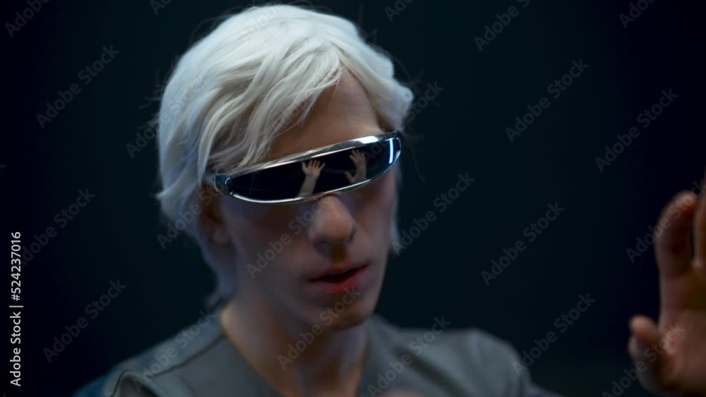 Involved man touching considering VR technologies. User exploring metaverse Involved man touching considering VR technologies. User exploring metaverse