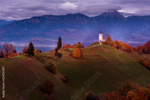 Sunset with church, top of hill, Slovenia, Jamnik