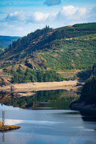 Low water levels due to drought conditions at at Llyn Brianne reservoir, Wales, UK photo