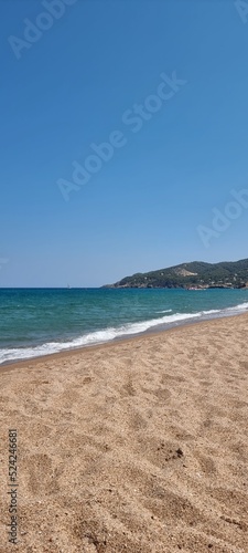 Pals Spain July 2022 lonely beach and the sea against blue sky © Silke