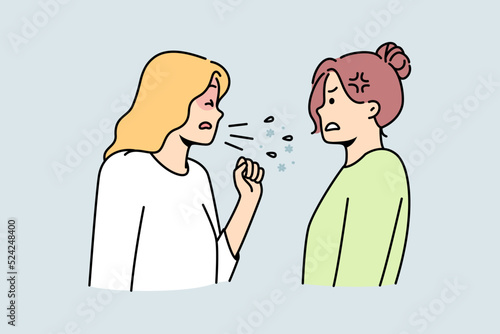 Unhealthy woman cough share disease to friend or colleague. Sick unwell female suffer from covid or cold infect girl standing near. Contagious sickness. Vector illustration. 