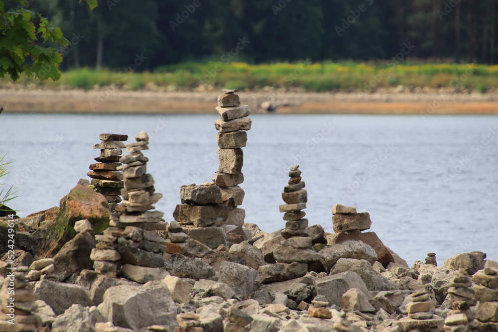 pyramids of stones on the river Daugava pyramids of stones on the river Daugava