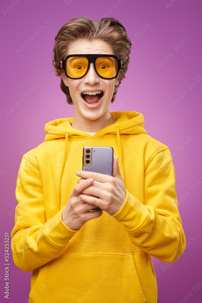 excited boy with phone excited boy with phone