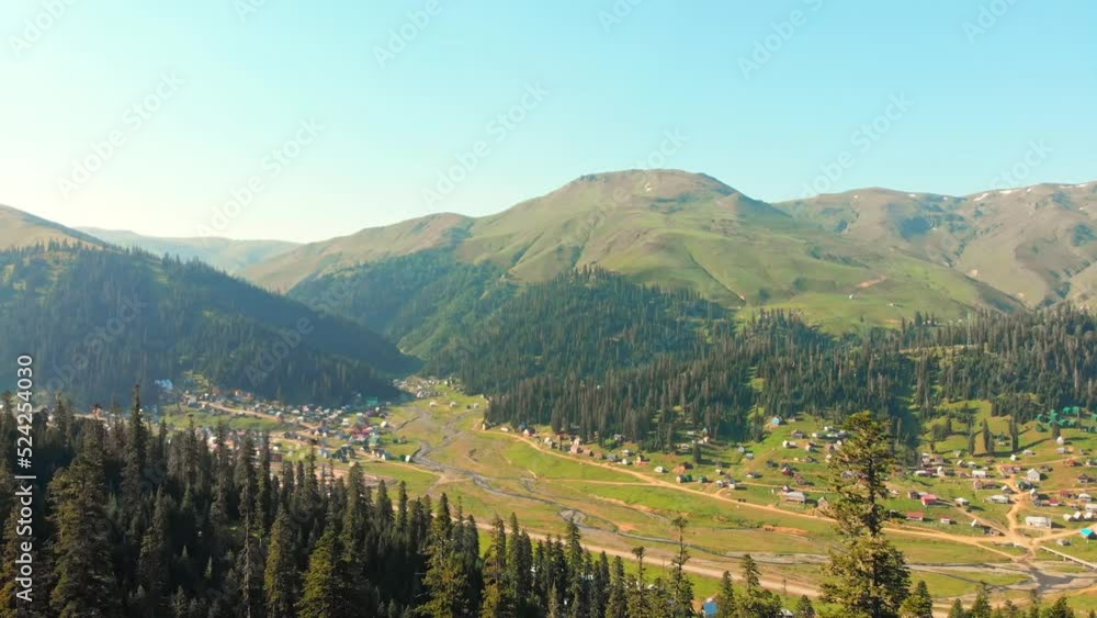 Static view river and Bakhmaro village panorama in summer. FAmous travel landmark summer resort in caucasus mountains. Holiday destination in Guria, Caucasus Static view river and Bakhmaro village panorama in summer. FAmous travel landmark summer resort in caucasus mountains. Holiday destination in Guria, Caucasus