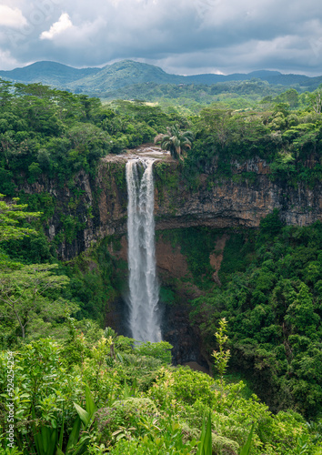 Beautiful natural waterfall Chamarel, Mauritiu island in the summertime in Africa