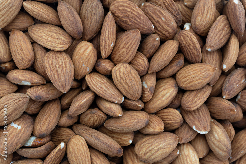 Fototapeta premium Overhead view of a group of almond nuts.