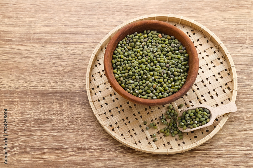 Group of green mung beans served on wooden bowl. Food preparation Group of green mung beans served on wooden bowl. Food preparation