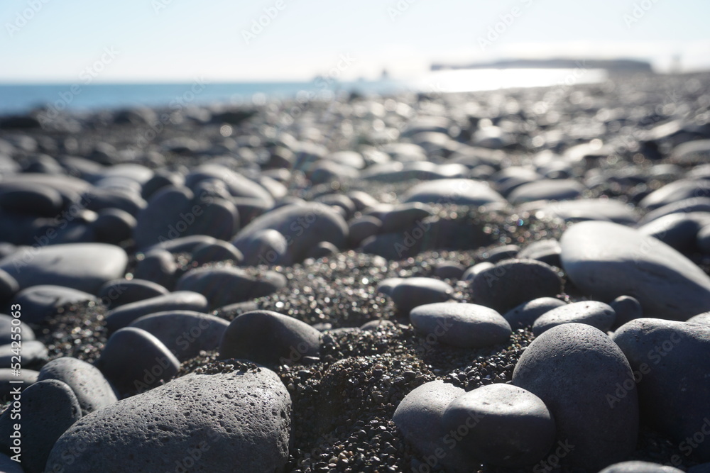 Obraz premium Pebbles on Reynisfjara Black Beach in Iceland