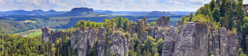 Beautiful landscape, panorama, banner - view of the Bastei rock formations and the Bastei Bridge in the Elbe Sandstone Mountains, in Saxony, Germany