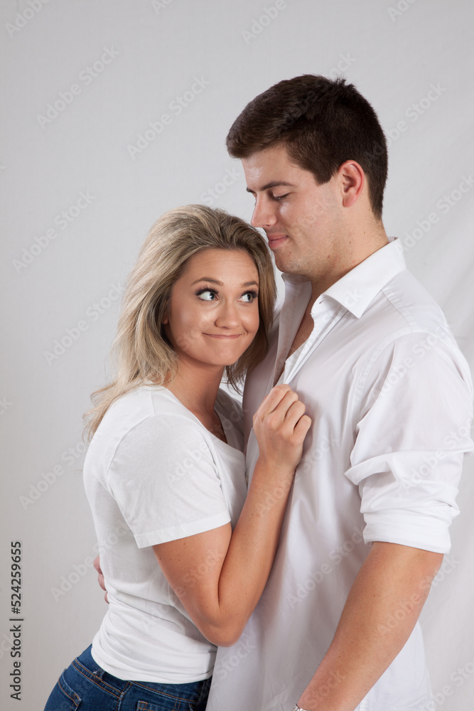 Fototapeta premium Romantic couple smiling together with joy