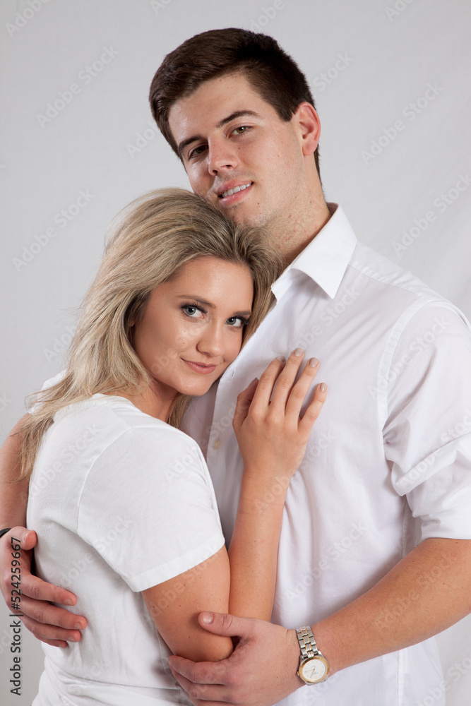 Romantic couple smiling together with joy Romantic couple smiling together with joy