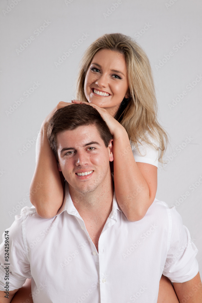 Romantic couple smiling together with joy Romantic couple smiling together with joy