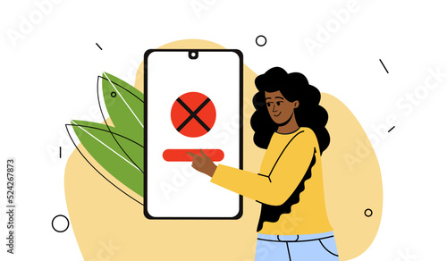 A young girl is standing next to a mobile phone. Girl tap on the screen. Denial of access, prohibition